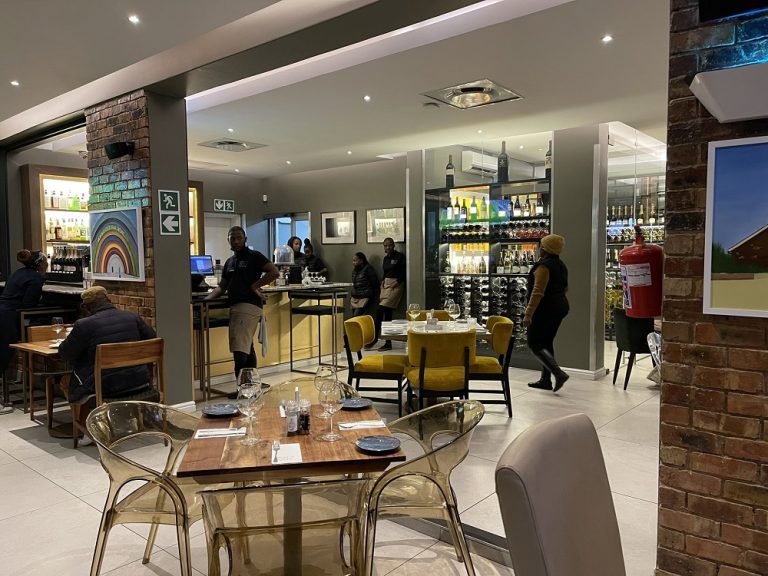 Restaurant and dining area at Soweto Boutique Hotel